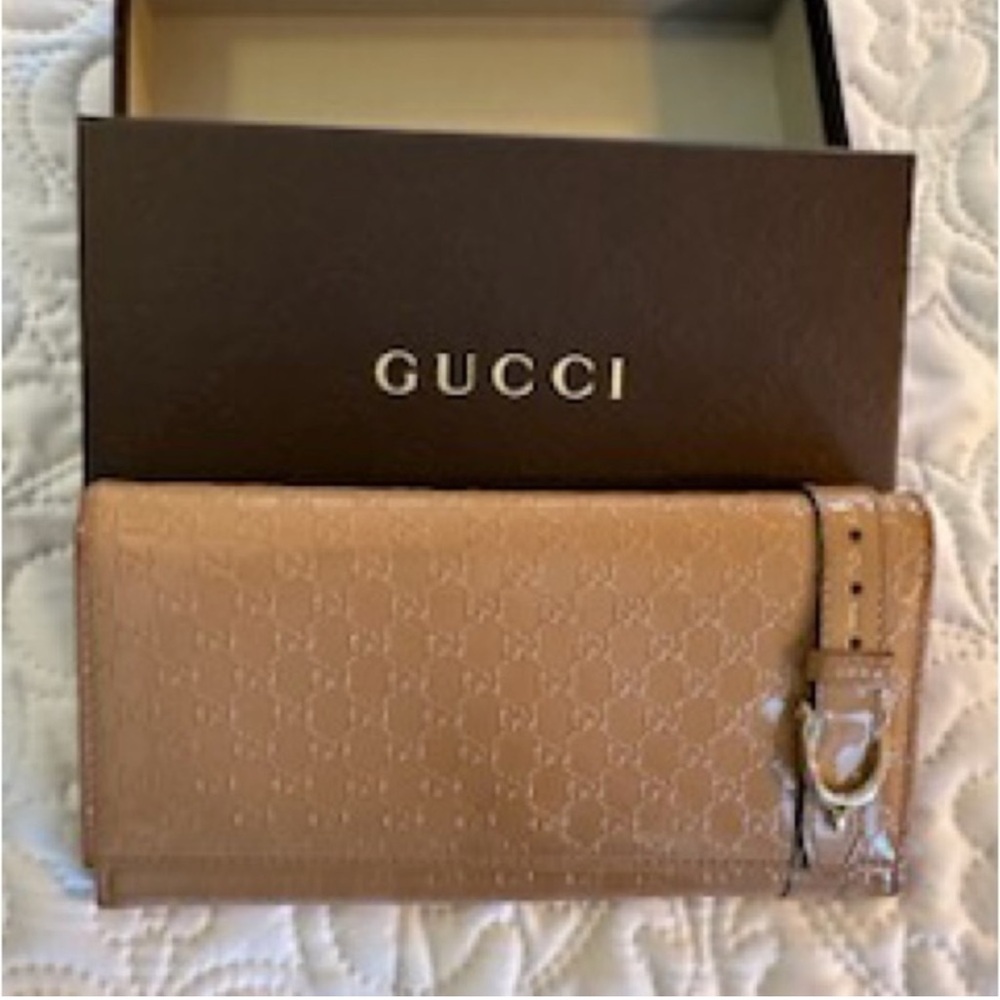 Authentic Gucci Tan Embossed Wallet